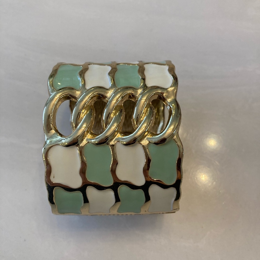 Green and white arm cuff